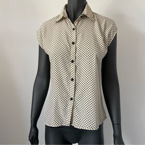 6. VTG Tiara polka dot button down camisole
